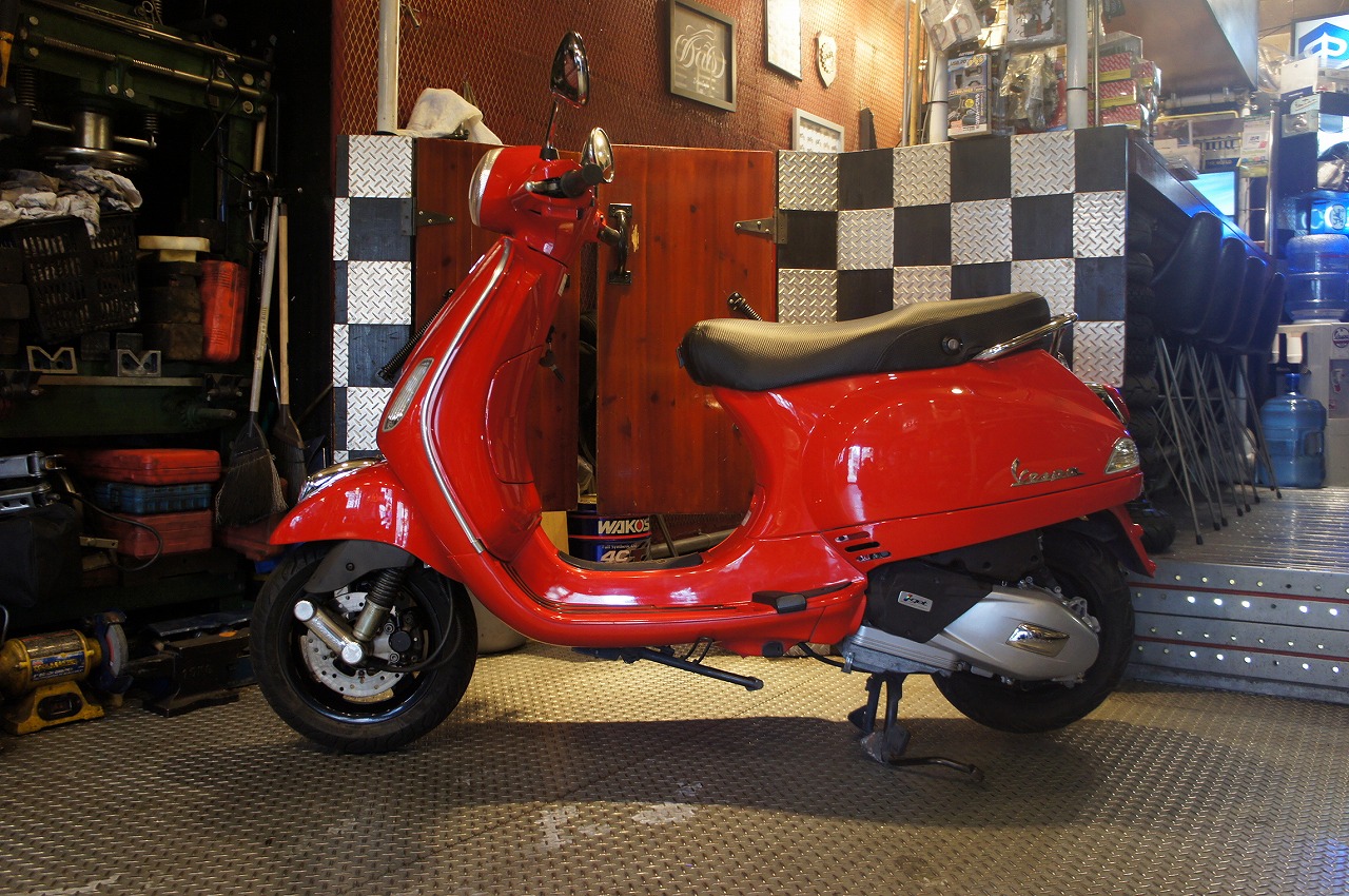 Vespa LX125i-get