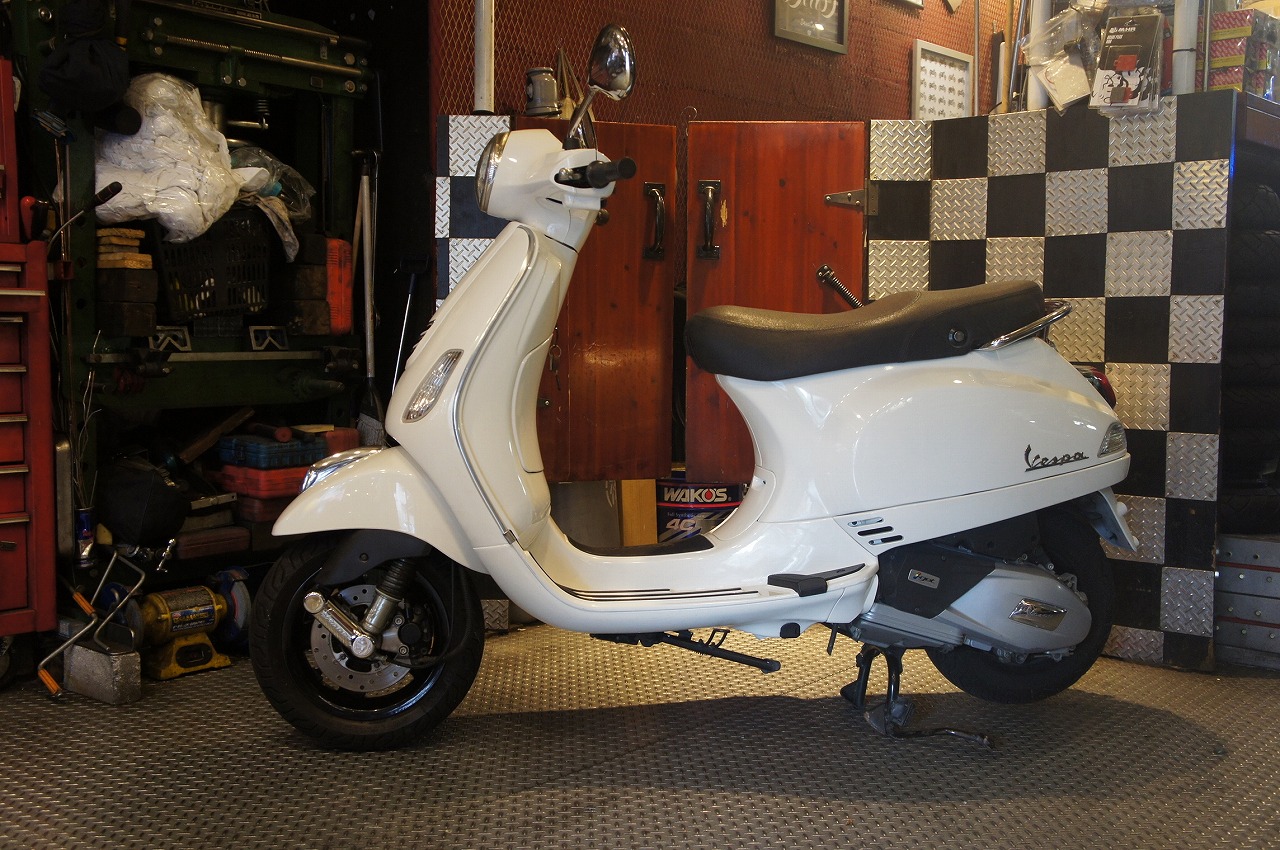 Vespa LX125i-get